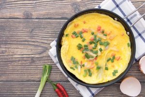 vecteezy omelette in a pan that is placed on a wooden background 8091986 961