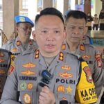 identitas pelaku penyiraman air keras ke polisi