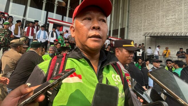 Ketua Komunitas Keluarga Besar Ojek Tangsel (KBOT), Jaja (50. Foto: Andre Pradana/Tangselife