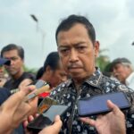 Plt Sekjen Kemenlu Republik Indonesia, Heru Hartanto Subolo, saat menghadiri pemakaman Zetro Leonardo Purba di TPU Sari Mulya, Kamis (11/9). Foto: Andre Pradana/Tangselife